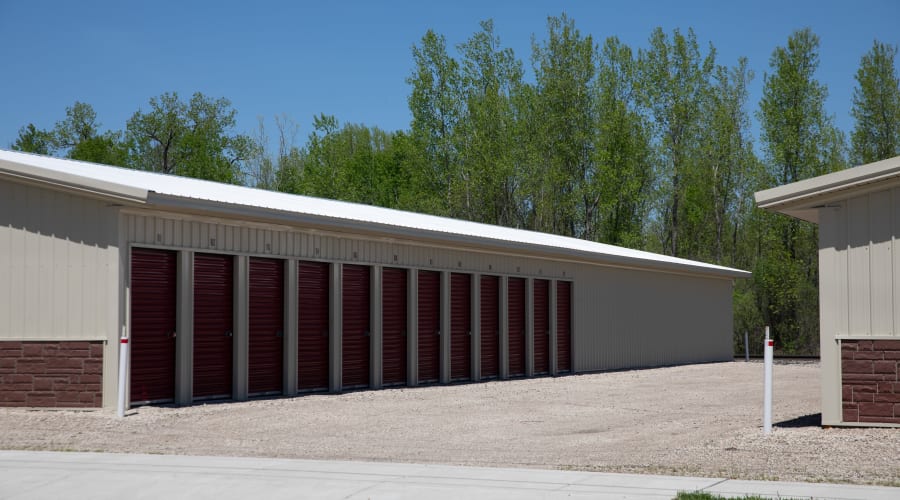 Rows of storage units with brown doors at KO Storage of Tomah - Washington in Tomah, Wisconsin
