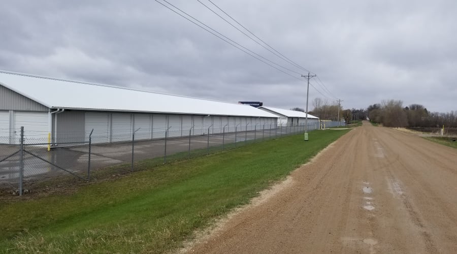 The fully fenced perimeter and storage units at KO Storage of Buffalo in Buffalo, Minnesota