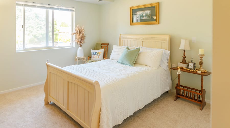 Colorfully decorated memory care resident's bedroom at Peoples Senior Living in Tacoma, Washington