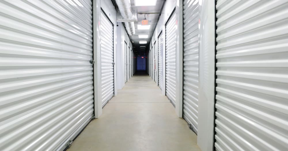 Storage units with white doors at Midgard Self Storage in Brevard, North Carolina