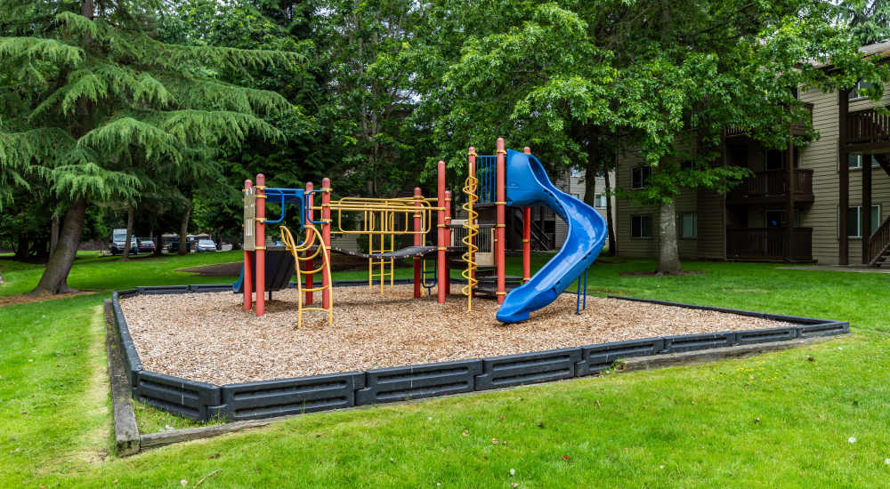 Community playground with slide at Campbell Run Apartments in Woodinville, Washington