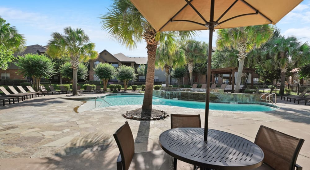 Swimming pool with patio closeup at River Pointe in Conroe, Texas