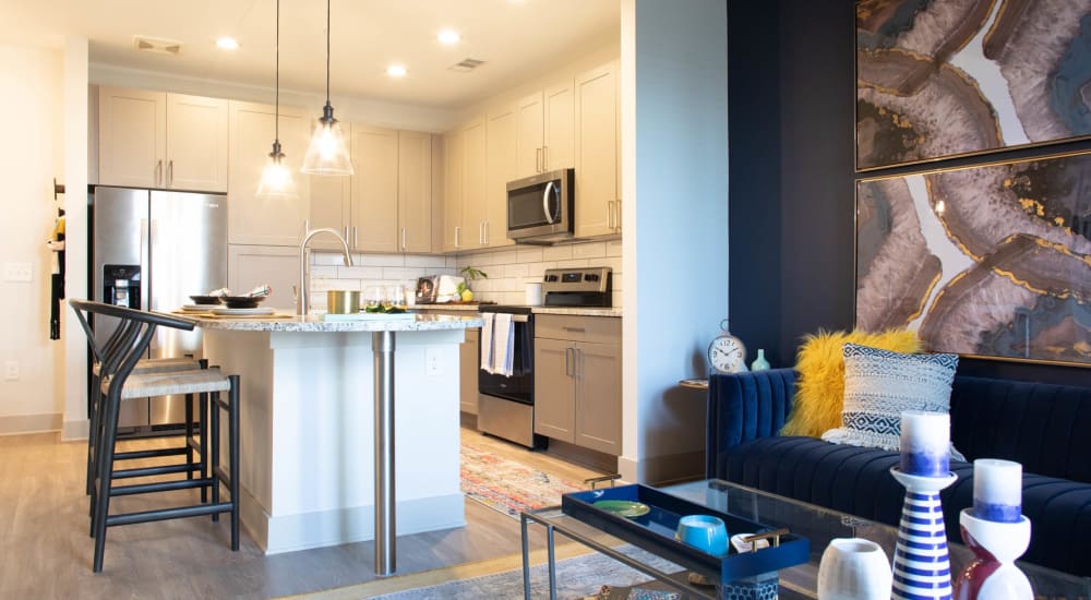 A dining area and open kitchen at Foundry Yards in Birmingham, Alabama