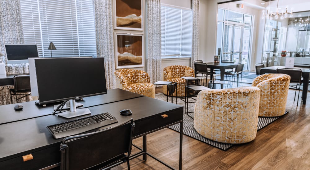 Smart phone with speaker on table in a model home's living space at Altoview Apartment Homes in Charlottesville, Virginia