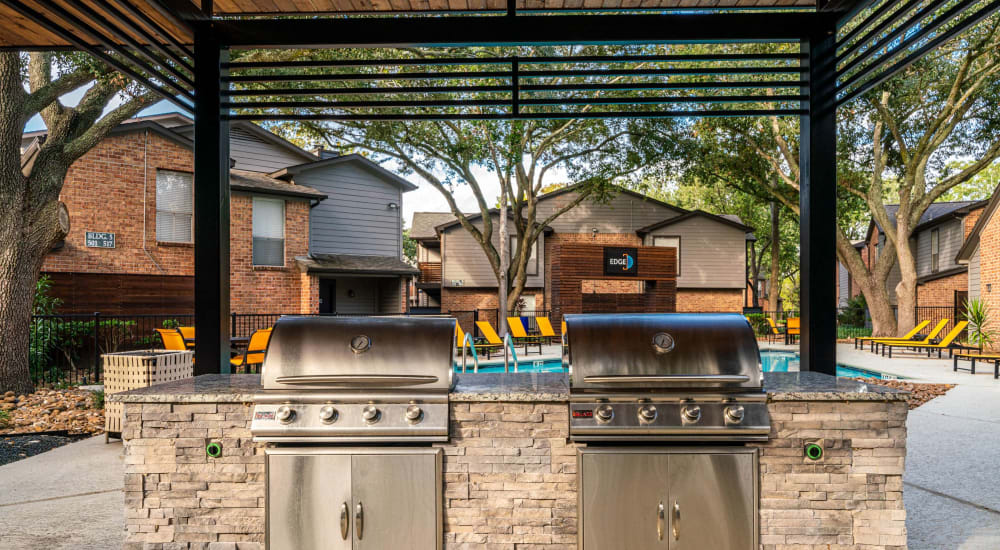 Residents barbeque at The Edge at Clear Lake in Webster, Texas