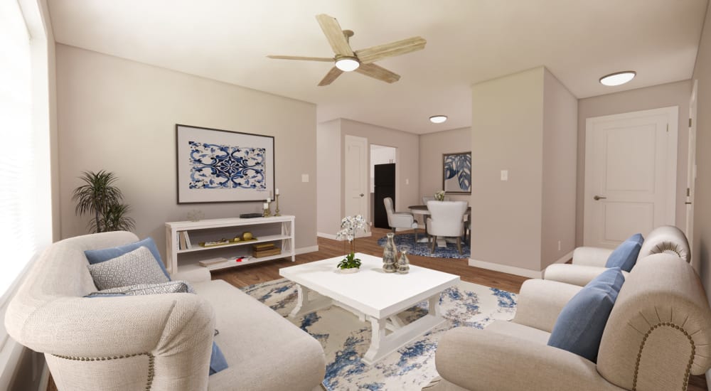 A render of a comfortable living room in a model home at The Lyle in Fort Walton Beach, Florida