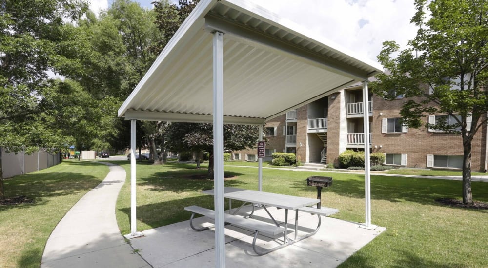 A covered picnic bench at Chadds Ford Apartments in Midvale, Utah