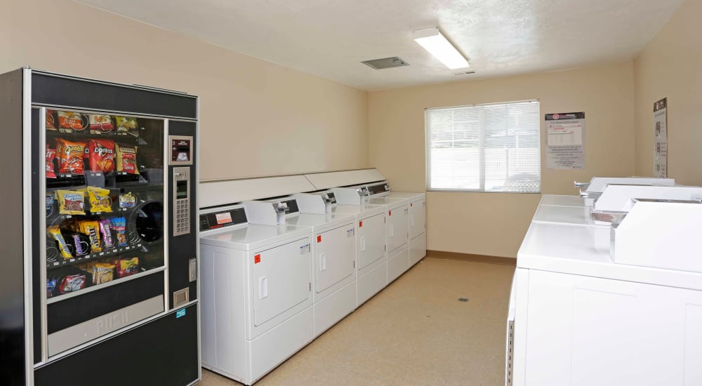 Washers and dryers in the laundry room at Elk Run Apartments in Magna, Utah