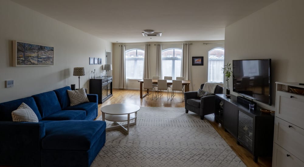 Sofa in home's living space at The Lombardi in New Rochelle, New York