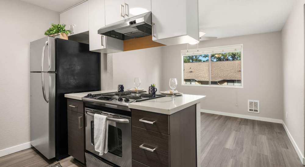 Kitchen with modern appliances The Summit in Redmond, Washington