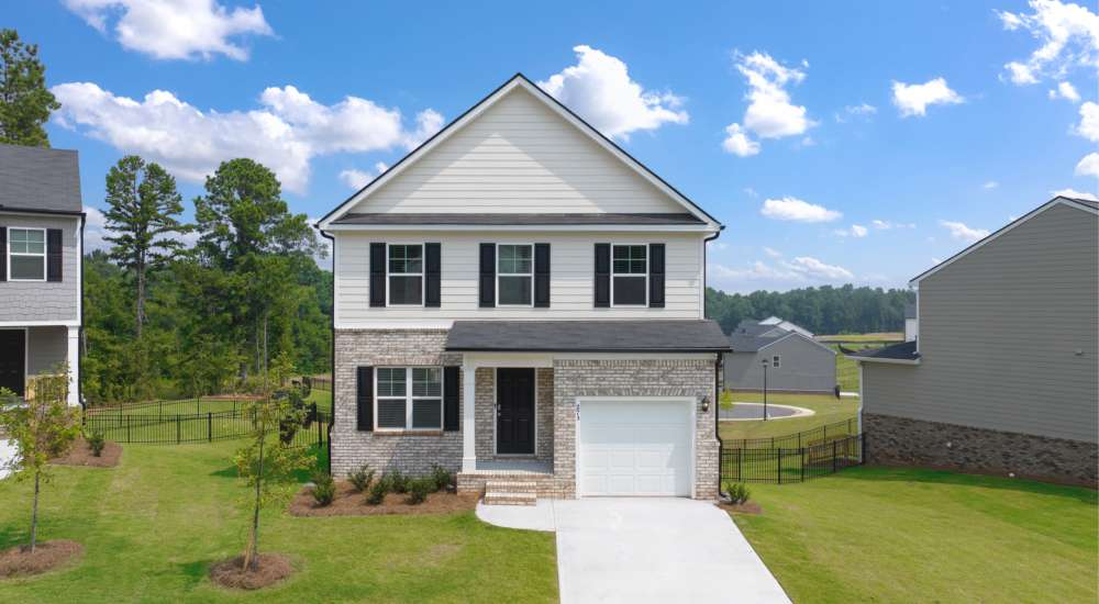 View of a home from the street at The Lakes at Statham in Statham, Georgia