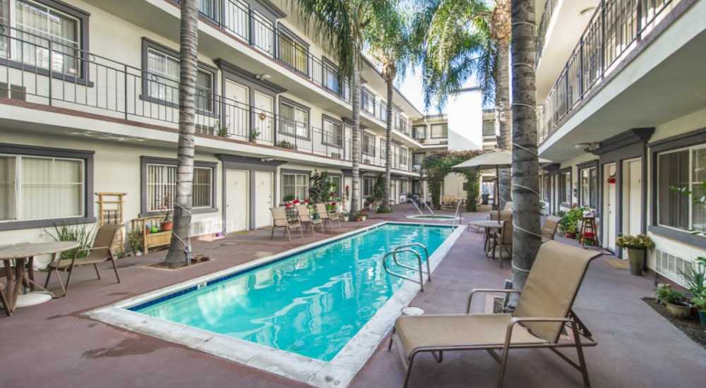 Community clubhouse with lots of seating at Tarzana Courtyard in Tarzana, California