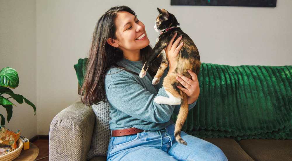 Woman holding her cat at North Hills Place in Richland Hills, Texas