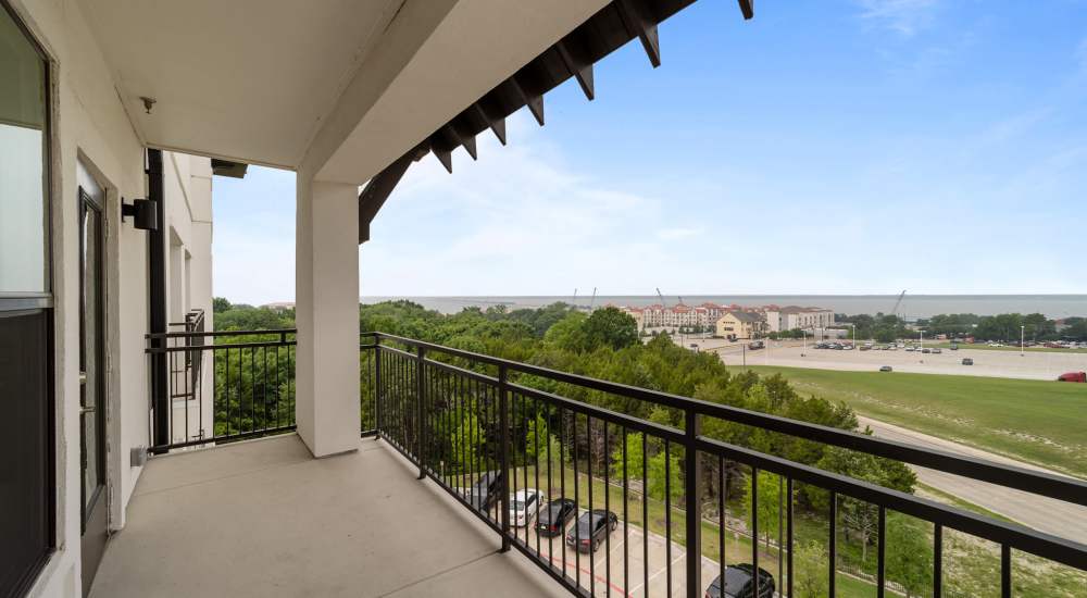 View of lake from patio at Harbor Hill in Rockwall, Texas                                