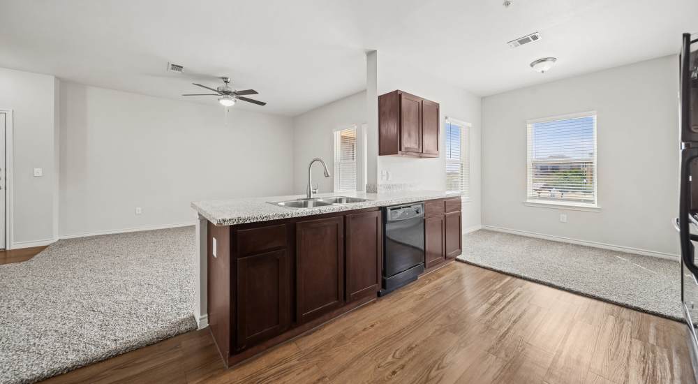 Gourmet kitchen with updated appliances at Sunset Lodge in Odessa, Texas              