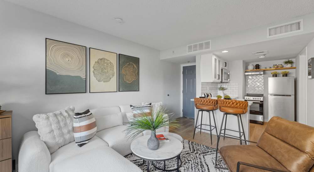 Spacious and well-lit modern apartment with breakfast bar and cozy kitchen at The Otis in Dallas, Texas