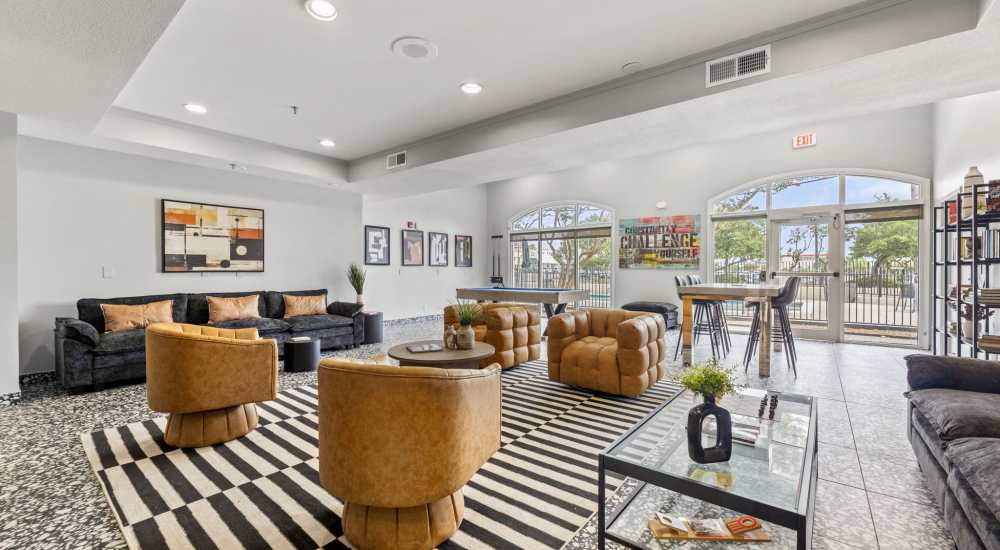 Modern apartment with hardwood flooring and energy efficient appliances at The Otis in Dallas, Texas