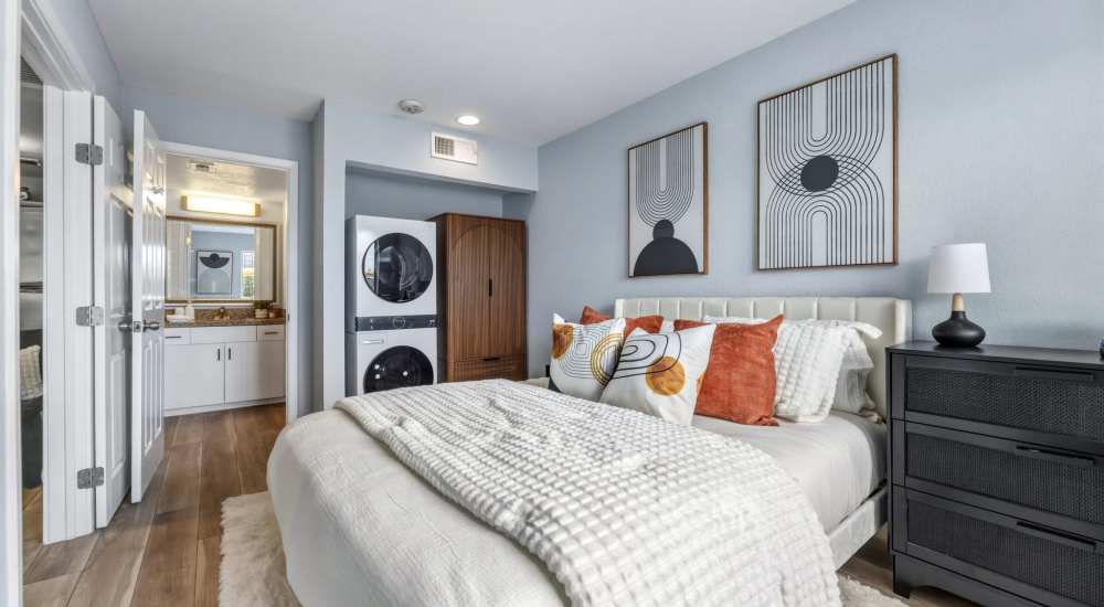 Bedroom with windows at The Nora in Dallas, Texas     