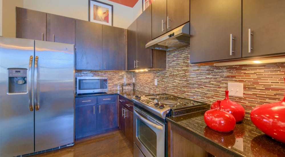 Stainless steel refrigerator and red decor at Midway Station in Midland, Texas 