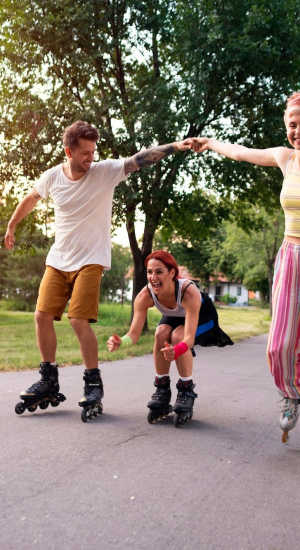 Friends Rollerblading at The Abbey at Memorial In Houston, Texas