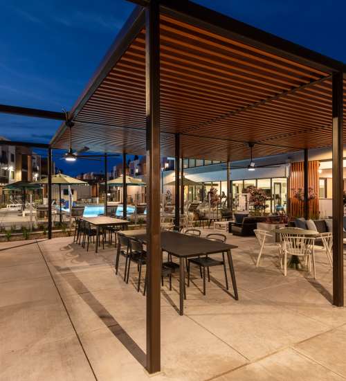 Exterior building with balcony at Sutter Green Apartments in Sacramento, California