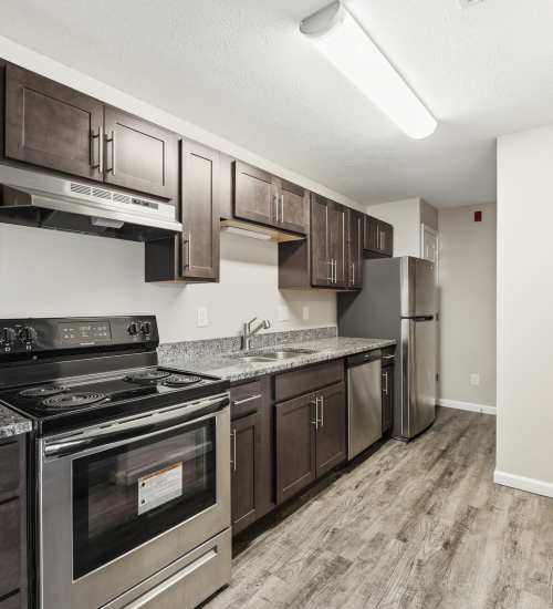 Kitchen with steel appliances at Spring Lake Apartments in Granger, Indiana