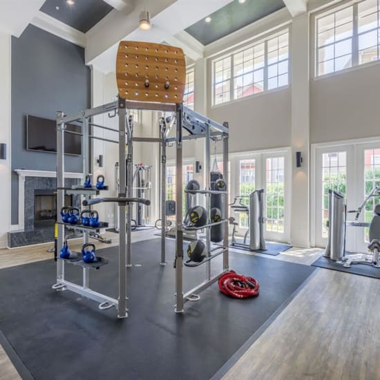 Free weights in the fitness center at Evergreens at Mahan in Tallahassee, Florida