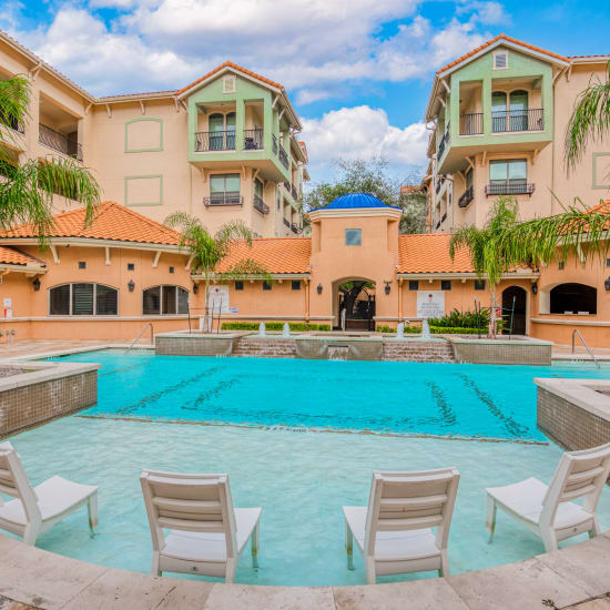 Community pool at Portico at West 8 Apartments in Houston, Texas