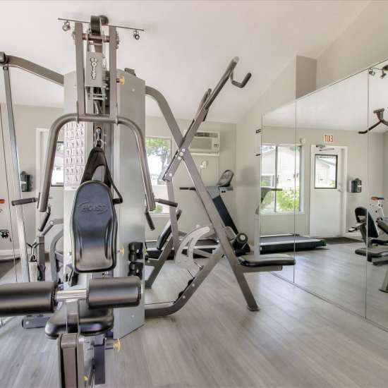 Well-equipped gym at Village Green Apartments in San Jose, California