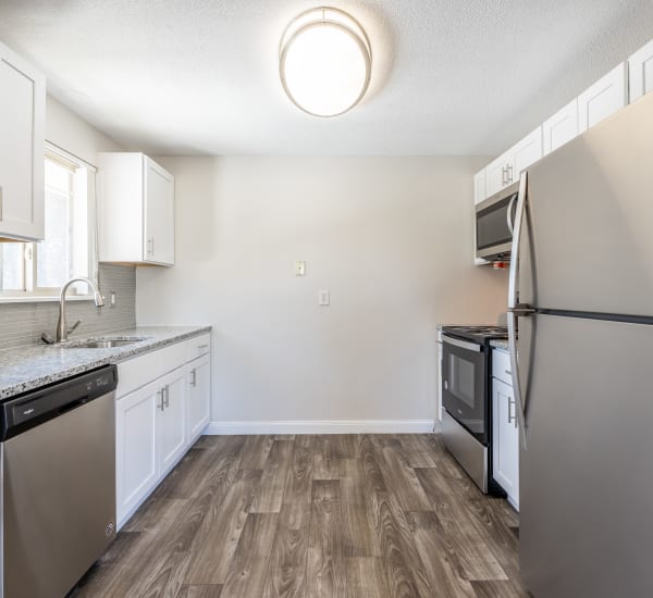 Beautiful modern kitchen with hardwood floors and all utilities included Long Pond Gardens Senior Apartments in Rochester, New York