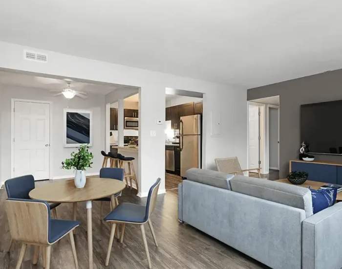 Open dining space and living room at Mount Prospect Greens Apartments in Mt Prospect, Illinois