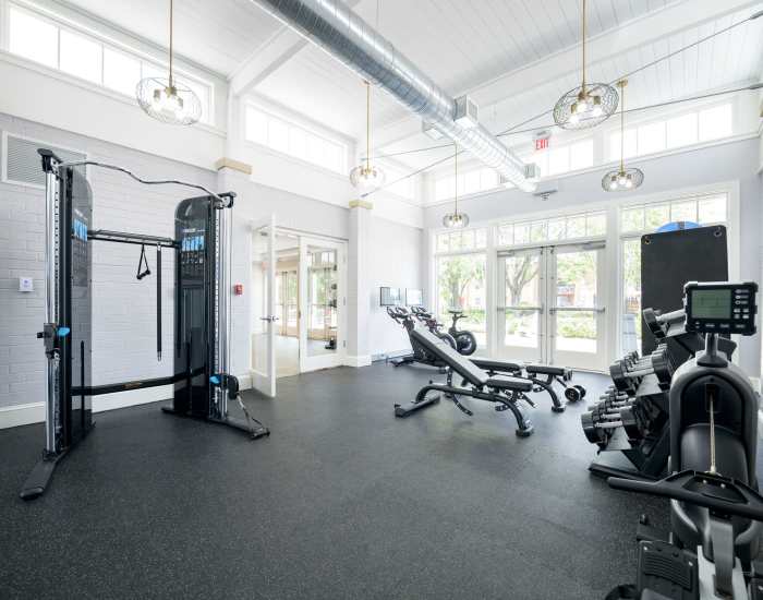 Fitness center with weight equipment at Beacon Hill Apartments in Alexandria, Virginia