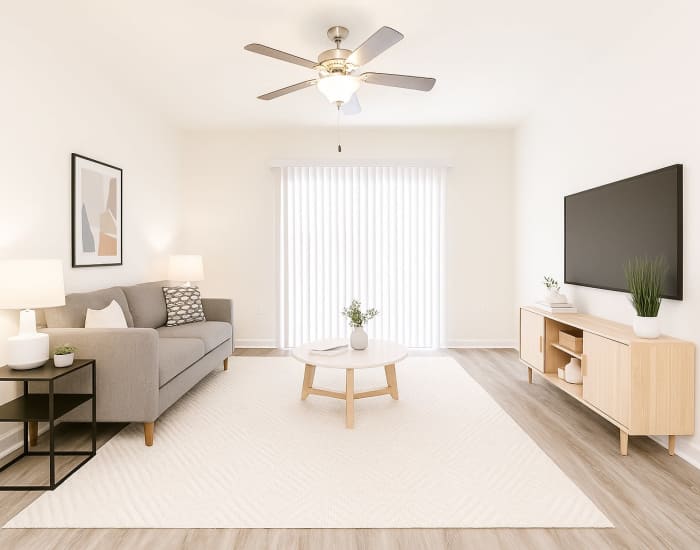 A large spacious living area with natural lighting at Hudson Woods in Gastonia, North Carolina