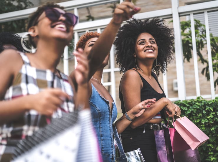 A group of friends shopping in the neighborhood near Palmetto Place in Miami, Florida