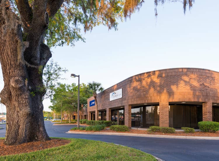 Well-managed landscaping and building facade at Fort Family Investments's commercial property, Interstate South Commerce Center, in Jacksonville, Florida