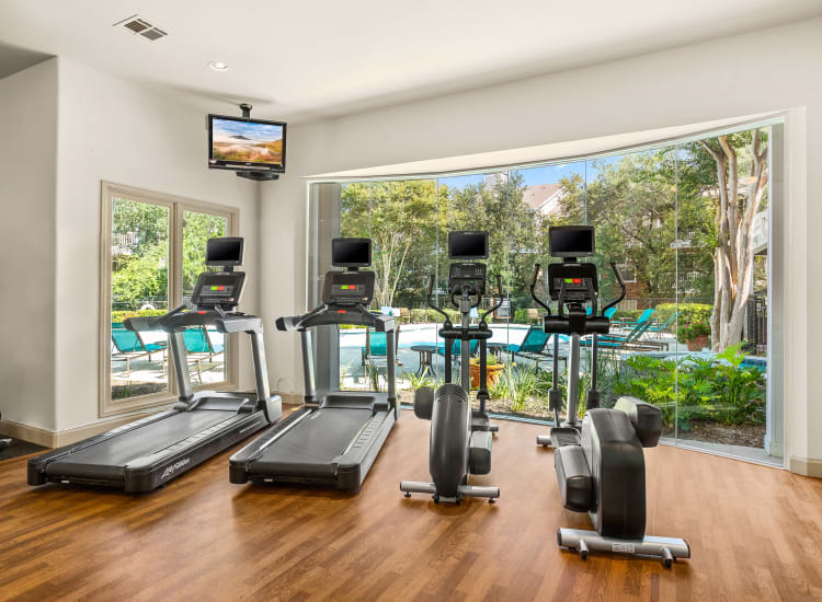Gym overlooking Swimming pool at The Lodge at Westover Hills in San Antonio, Texas