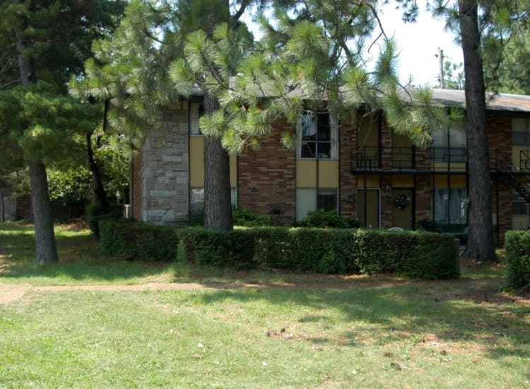 Well maintained lawn outside of housing at Mendenwood in Memphis, Tennessee