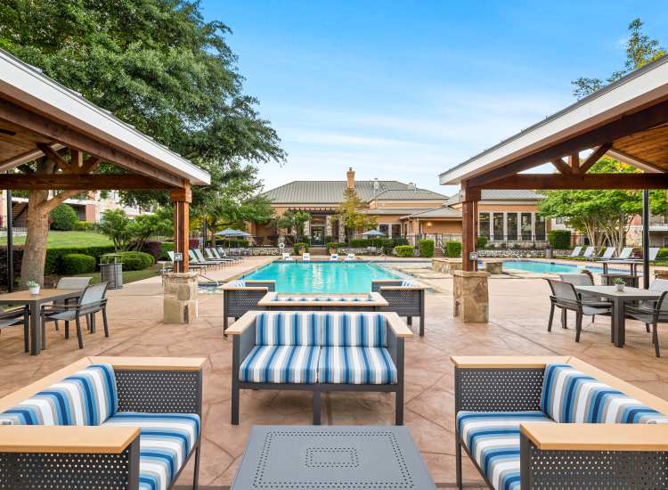 Ramada with view of pool at Onion Creek Luxury Apartments in Austin, Texas