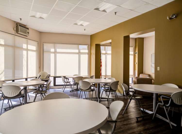 Large dining space at Bixby Brockton Apartments in Brockton, Massachusetts, 