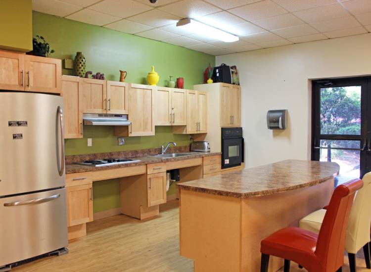 Kitchen with stainless-steel appliances at Fieldstone Apartments in Dorchester,Massachusetts