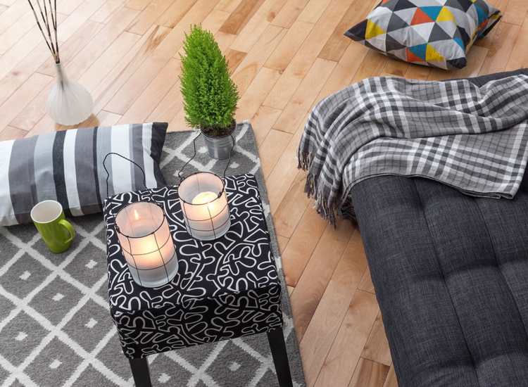 Living room with black sofa at Prospect Estates in Webster​,Massachusetts