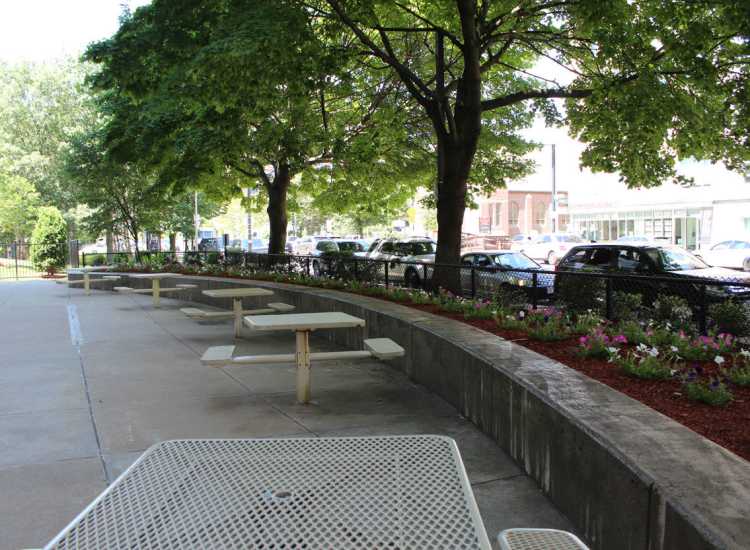 Outdoor seating area at Roxse Homes in Boston, Massachusetts