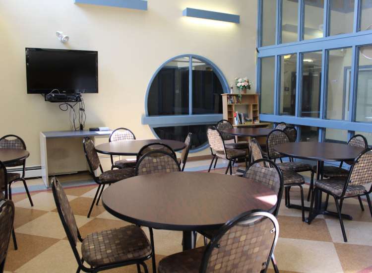 Community dining area at School House Brookledge Cummins in Mattapan,Massachusetts
