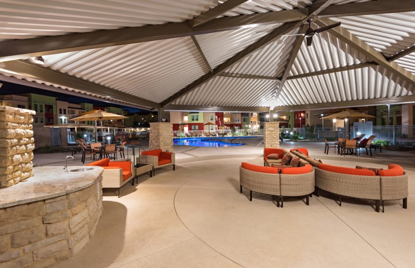 Resident lounge area by the pool at Southern Avenue Villas in Mesa, Arizona
