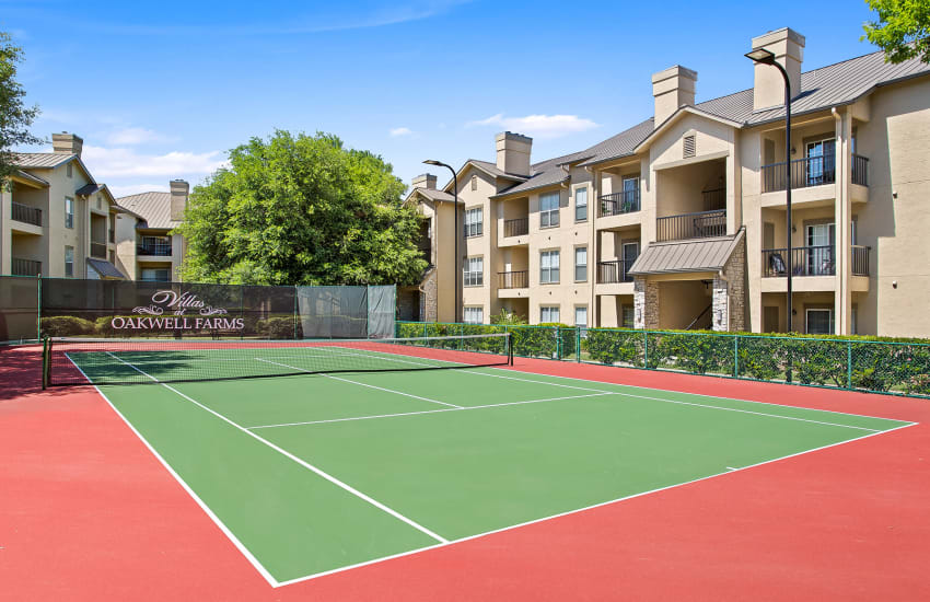 Full-sized tennis court at Villas at Oakwell Farms in San Antonio, Texas