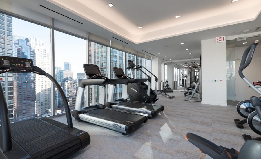 Fitness center for residents at Residences at 8 East Huron in Chicago, Illinois