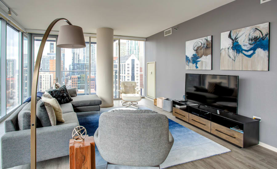 Residences at 8 East Huron's spacious living room a great view of Chicago, Illinois
