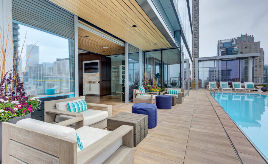 Poolside lounge chairs at Residences at 8 East Huron in Chicago, Illinois