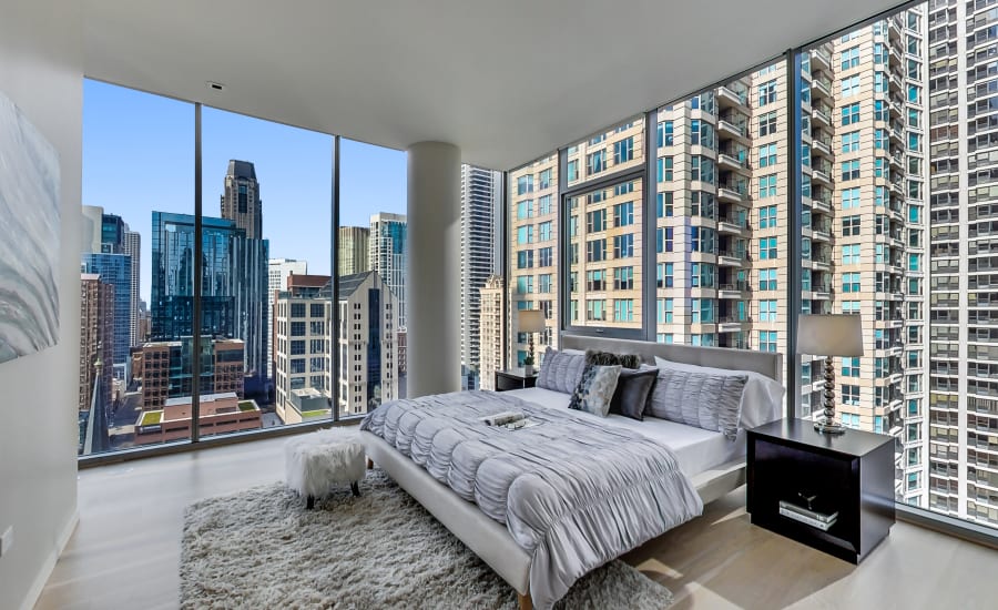 Beautiful Bedroom at Residences at 8 East Huron w/ City Views of Chicago, Illinois