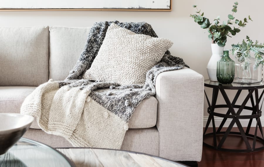 Cozy couch in a model home at The Southerly at St. Augustine in St Augustine, Florida